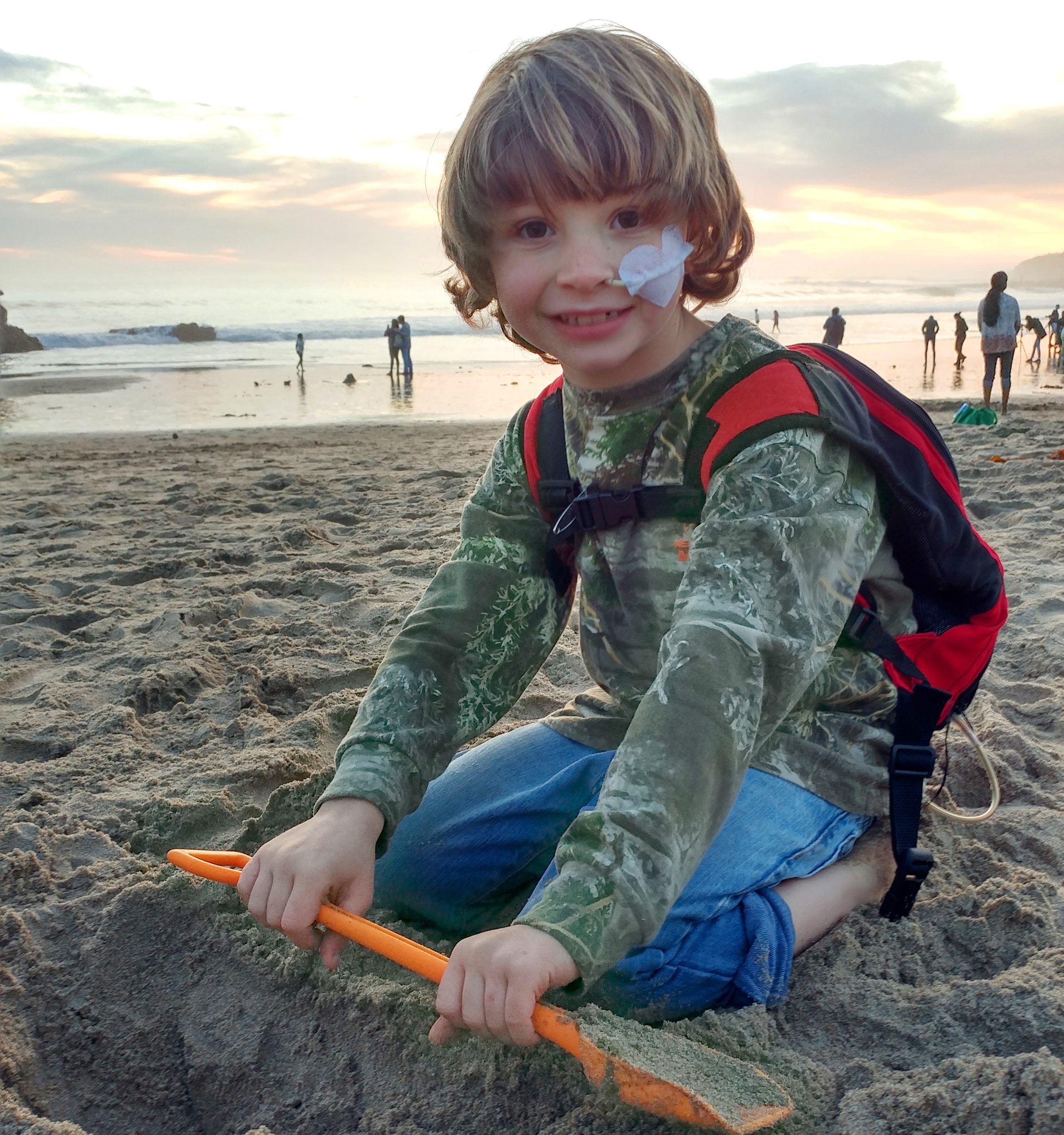 Gage with his VAD on the beach.